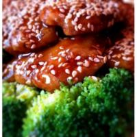 04. Sesame Seitan · Soy bean protein with a sweet sour brown sauce and sesame seed. Served with choice of rice.