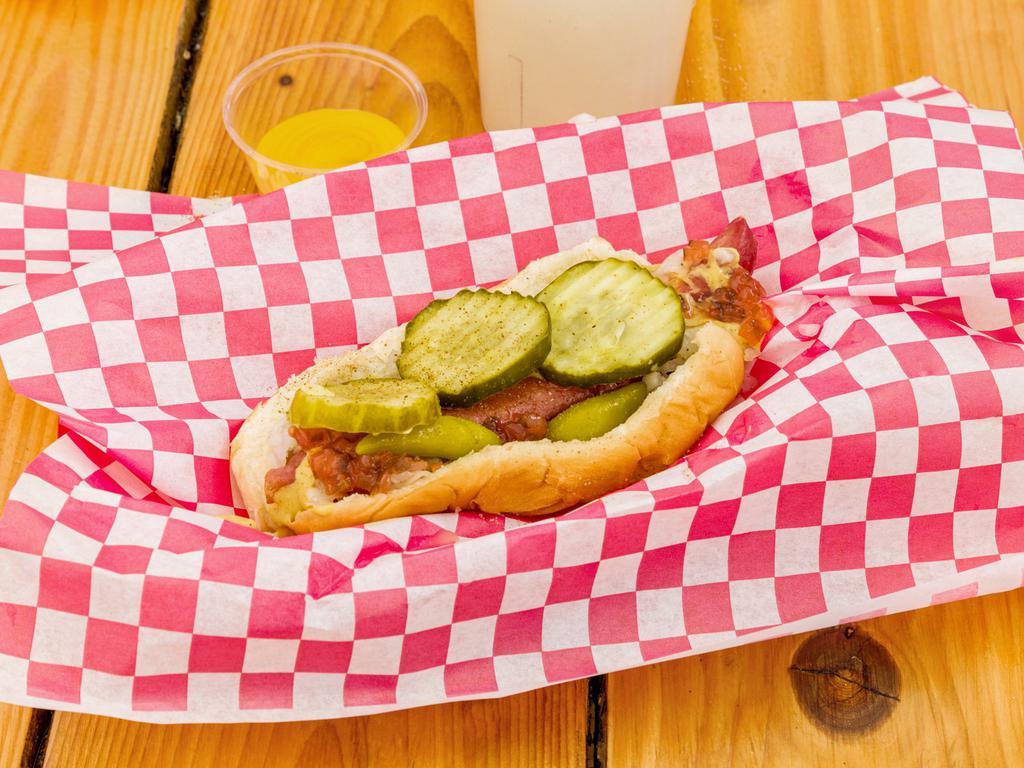 Zach's Favorite Dog · Brown mustard, red relish, sport peppers, onion, pickle slices, and celery salt.