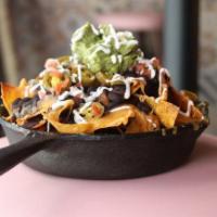 Nachos Amor Loco · three cheese blend, house pickled jalapeno & carrot, sour cream, pico de gallo, black beans,...