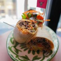 Burrito Loco · rice, black beans, pico de gallo, guacamole, sour cream, cotija cheese, side salad