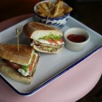 George's Chicken Sandwich · breaded chicken breast, oaxaca cheese, lettuce, tomato, avocado, pickled jalapeno & carrot, ...