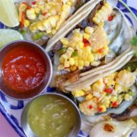 Champinones Tacos · mushroom, caramlizes onion, poblano peppers, pepper jack cheese, corn salsa