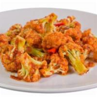 5. Lasooni Gobhi · Stir fried florets of cauliflower sauteed with garlic, ginger and sesame sauce.