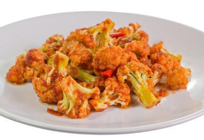 5. Lasooni Gobhi · Stir fried florets of cauliflower sauteed with garlic, ginger and sesame sauce.