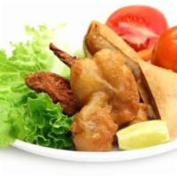 10. Vegetarian Platter · Combination of veg. samosa, veg. Pakora, onion fritters and Paneer Pakora.