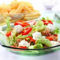 16. House Salad · Panjabi style green salad with the raita dressing.