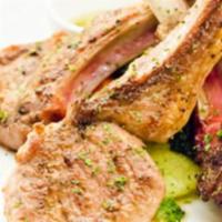 23. Tandoori Lamb Chop · Lamb chops marinated overnight with ginger and spices, grilled in clay oven.