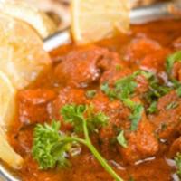 41. Lamb Vindalu · Goan style hot and sour lamb curry with potatoes.