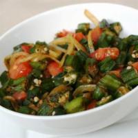 63. Bhindi Masala · Fresh okra sauted with onion, tomatoes ,bel pepers  and spices.