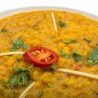 66. Navratan Korma · Assorted vegetables cooked in mild creamy sauce, sprinkled with dry nuts.