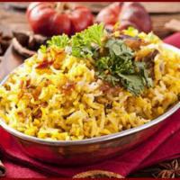 69. Chicken Biryani · Basmati rice cooked with pieces of chicken, herbs, spices, saffron, and nuts.