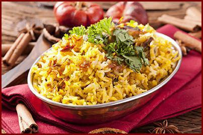 71. Goat Biryani  · Basmati rice cooked with pieces of goat, herbs, spices, saffron, and nuts.