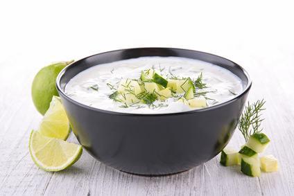 94. Raita · Whipped spiced yogurt with grated cucumber and carrots.