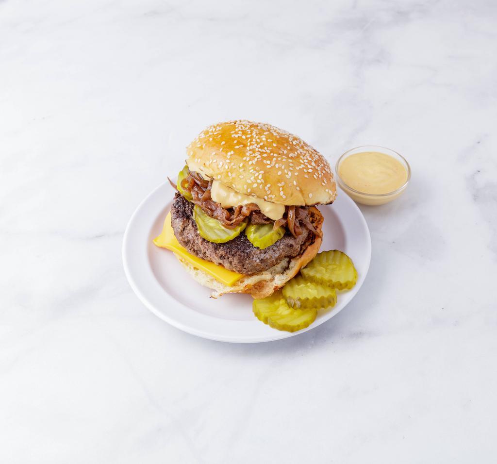 The Park Burger · American cheese, caramelized onions, pickles and chef's sauce.