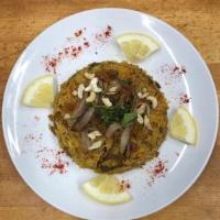 Goat Biryani · Aromatic Basmati rice cooked with goat, nuts, herbs and spices