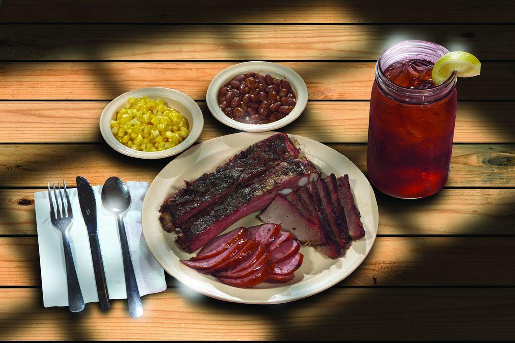 3 Meat Combo Plate · Choose from sliced brisket, smoked sausage, chopped brisket, pork ribs, grilled chicken breast, BBQ chicken, fried chicken breast, or chicken fried steak. Includes 2 sides