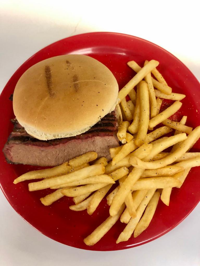 BBQ Sandwich with a side order · BBQ sandwich served with a side order.
Multiple meat choices available