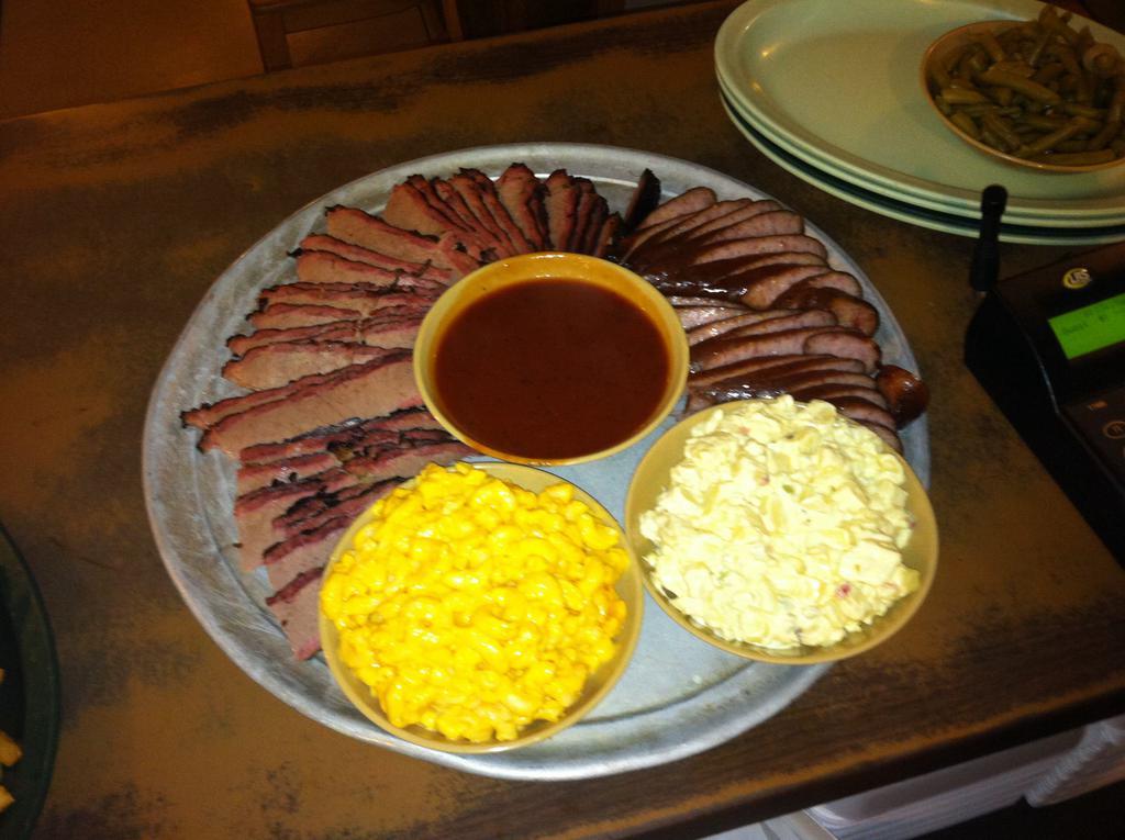 Family Meal #1 ·  2 pounds of meat, 3 pints of side orders,  and BBQ sauce.