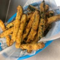 Fried Zucchini · Battered in buttermilk and flour. Request ranch  dressing for dipping if desired.