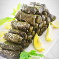 4 Piece Dolmadakia · Grape leaves stuffed with rice and herbs. Served with tzatziki.