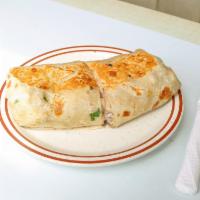 Burrito · Cicena, steak, al pastor, ham, or chicken. Veggie topped with tomato, lettuce, beans, sour c...