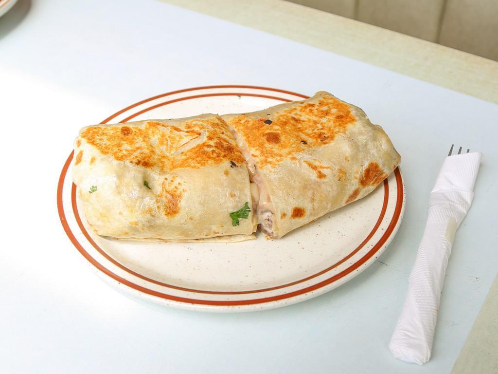 Burrito · Cicena, steak, al pastor, ham, or chicken. Veggie topped with tomato, lettuce, beans, sour cream, and cheese.