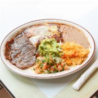 Combinacion Teloloaphan · Cecina combination served with two enchiladas, guacamole, pico de gallo, rice, and beans. Se...