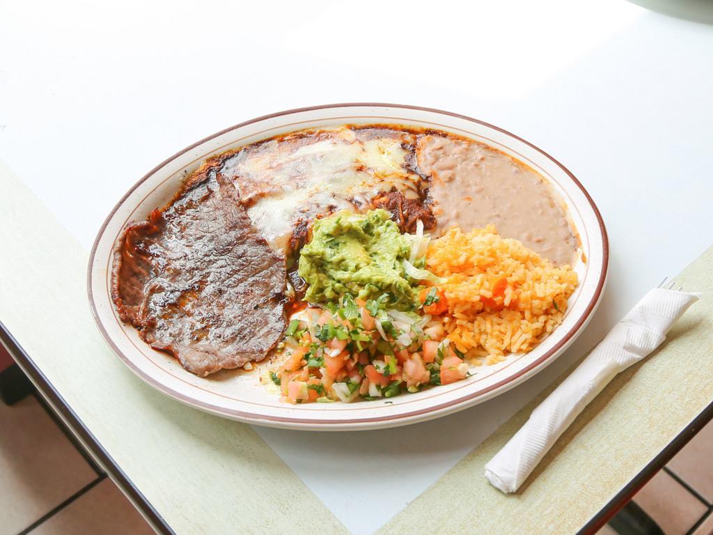 Combinacion Teloloaphan · Cecina combination served with two enchiladas, guacamole, pico de gallo, rice, and beans. Served with small salad, rice, beans, and handmade tortillas.