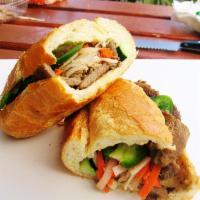 13. Grilled Pork with Lemongrass Sandwich · Most popular sandwich, lean pork cooked with lemongrass and house style marinade.