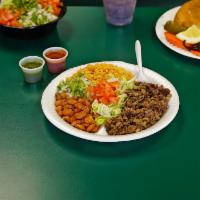 Combo Plate · Plate with rice, beans, choice of meat, onions, cilantro, salsa lettuce and tomato, guacamol...