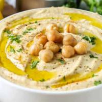 Hummus Tray · Chickpea Beans Mixed with Tahini Sauce, Lemon Juice, Garlic & our Secret Spice