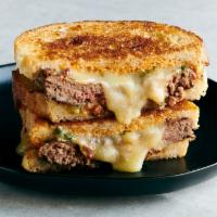 Patty melt  · Burger patty,grilled onions,Swiss cheese,grilled mushrooms served on ray bread 