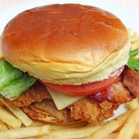 Crispy chicken sandwich  · Fried chicken patty,lettuce ,tomatoes,mayo on a bun