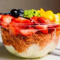 Kunafa bowl  · Vanilla Custard , Shredded pastry dough , Pineapple, strawberry , blueberry  , pistachios , ...