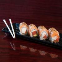 Salmon Lemon Pepper Roll · Crabmeat, avocado, and spicy tuna, topped with seared salmon and lemon pepper.