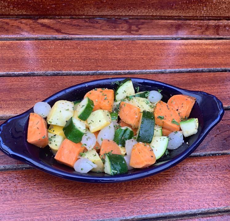 Roasted Vegetables · Roasted squash, zucchini, pearl onions and sweet potatoe.