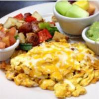 Cafe Vida Migas · Scrambled eggs, cheddar & jack cheese, tortilla strips, roasted tomatoes salsa, topped with ...