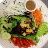 Organic Baby Greens Salad · Organic greens, shredded carrots, cucumber, tomatoes, roasted sunflower seeds, freshly slice...
