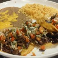 Dinner 3 Tacos · Served with Spanish rice and refried beans.