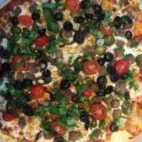 Amigos Latino Lovers Pizza · Mozzarella, refried bean sauce, ground beef, jalapenos. After cooking: green onion, black ol...
