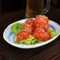 A3. Noodies Wings · Crispy chicken wings cooked with Noodies's special sauce topped with sesame seed