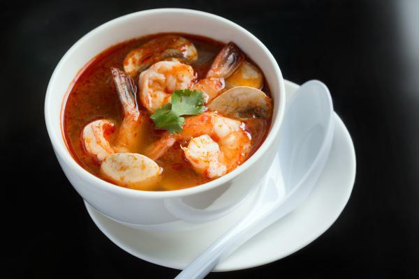 SP1. Tom Yum Soup · Thai hot and sour soup with shrimp pastes, lemongrass, lime leaves, lime juice, chili paste, mushroom and fish sauce with your choice of chicken, shrimps, vegetable or tofu. Topped with cilantro. Gluten-free.