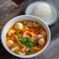 Tom Yum Narm Khon Tha Lay (Large Seafood Tom Yum) · Thai hot and sour soup with shrimp chili paste, fishball, Shrimp and Calamari mixed with lem...