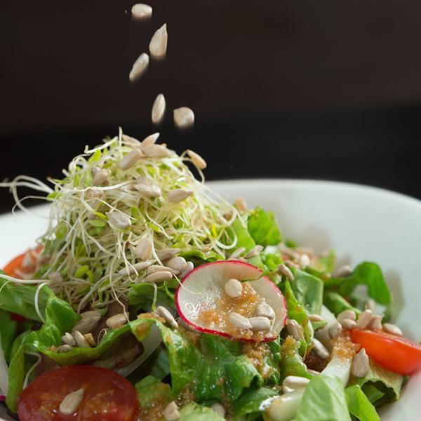S10. Green Market Salad · Mixed green vegetable, onion, tomatoes, radish, with ginger honey soy dressing.