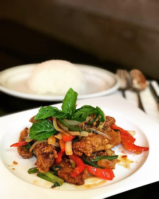 F11. Chic Krapraw · Chic a chicken sauteed with onions, long hot chili, basil leaves, scallion and basil sauce served with jasmine white rice.