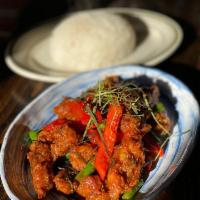 Chic Prik Khing · Crispy homemade fried chicken stir fried with chilli paste, fresh lime leaves, string bean, ...