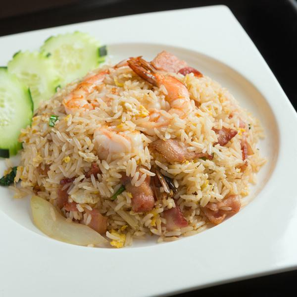 R5. Thai Fried Rice · Stir fried rice with onion, scallion, Chinese broccoli, tomatoes and egg.