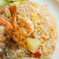 R7. Pineapple Fried Rice · Stir fried rice with shrimp, ham, pineapple, tomatoes, onion, scallion, cashew nuts, egg and...