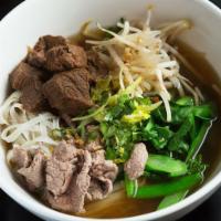 N1. Kwaytiew Nuer · Beef noodle soup with stew beef in beef broth. Thin rice noodle, meat ball, bean sprouts and...