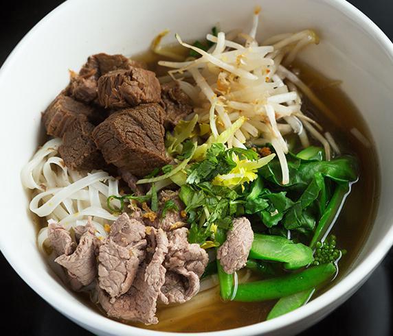 N1. Kwaytiew Nuer · Beef noodle soup with stew beef in beef broth. Thin rice noodle, meat ball, bean sprouts and Chinese broccoli topped with cilantro.